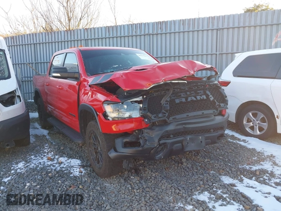 2021 Ram 1500 Rebel with VIN 1C6SRFLT2MN591844, listed as a IAAI auction lot 40410248 with 84,759 mi miles and . Bid and sale history available at DreamBid. Image 1.