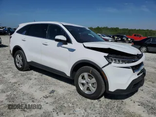 2023 Kia Sorento LX z VIN 5XYRGDLC7PG203021, wystawiony jako Copart lot #52637205 z przebiegiem 40 178 mil mil oraz Szkody całkowita. Historia ofert i sprzedaży dostępna na DreamBid. Obrazek 4.