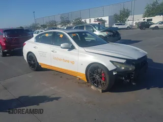 2014 Infiniti Q50 Premium with VIN JN1BV7AP8EM674009, listed as a IAAI auction lot 42598117 with 158,411 mi miles and . Bid and sale history available at DreamBid. Image 1.
