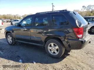 2005 Jeep Grand Cherokee Laredo with VIN 1J4HS48N05C566325, listed as a Copart auction lot 84743394 with 160,840 mi miles and Salvage Title. Bid and sale history available at carsss.com. Image 2.