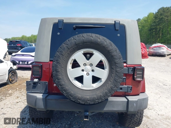 2007 Jeep Wrangler Unlimited Sahara with VIN 1J4GA59187L116585, listed as a IAAI auction lot 41996297 with 151,961 mi miles and . Bid and sale history available at DreamBid. Image 16.