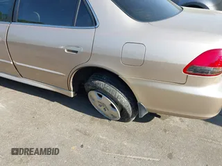 2002 Honda Accord EX z VIN 1HGCG16572A033397, wystawiony jako IAAI lot #42055022 z przebiegiem 225 073 mil mil oraz . Historia ofert i sprzedaży dostępna na DreamBid. Obrazek 13.