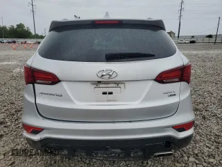 2017 Hyundai Santa Fe 2.4L z VIN 5XYZUDLB8HG500297, wystawiony jako Copart lot #58005165 z przebiegiem 91 871 mil mil oraz Szkoda całkowita • Salvage title. Historia ofert i sprzedaży dostępna na DreamBid. Obrazek 6.