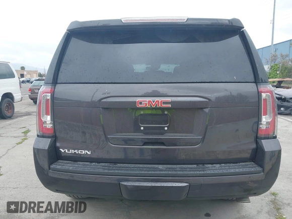 2015 GMC Yukon SLT with VIN 1GKS1BKC6FR245564, listed as a IAAI auction lot 42139295 with 149,088 mi miles. Bid and sale history available at carsss.com. Image 16.