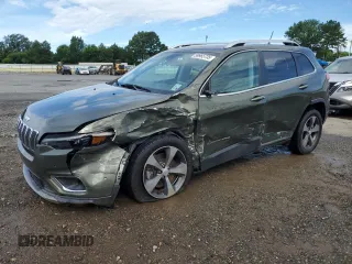 2019 Jeep Cherokee Limited with VIN 1C4PJLDB6KD145077, listed as a Copart auction lot 59965735 with 127,494 mi miles and Salvage title. Bid and sale history available at DreamBid. Image 1.
