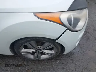 2012 Hyundai Veloster w/Gray Int с VIN KMHTC6ADXCU074298, выставлен на аукционе IAAI как лот 42353923 с пробегом 129 114 миль миль и . История ставок и продаж доступна на DreamBid. Изображение 13.