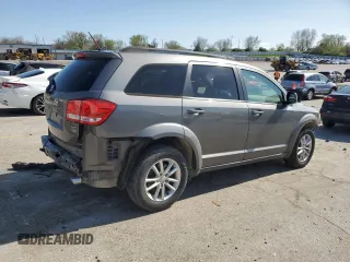 2013 Dodge Journey SXT with VIN 3C4PDCBG3DT571134, listed as a Copart auction lot 52068295 with 224,302 mi miles and Salvage Title. Bid and sale history available at carsss.com. Image 3.