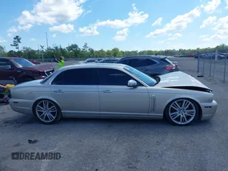 2009 Jaguar XJ with VIN SAJWA94C49TH30042, listed as a IAAI auction lot 41898085 with 145,832 mi miles and . Bid and sale history available at DreamBid. Image 13.