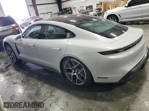 2025 Porsche Taycan with VIN WP0AA2Y12SSA08315, listed as a Copart auction lot 56624715 with 6,910 mi miles and Salvage title. Bid and sale history available at DreamBid. Image 2.