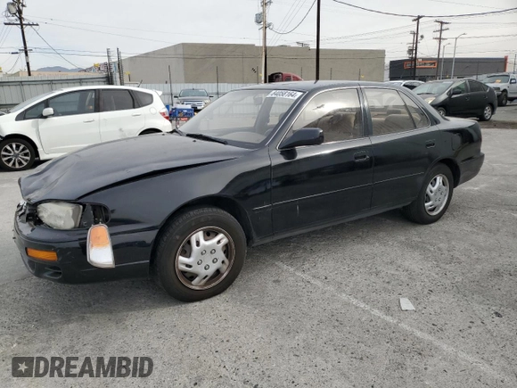 1995 Toyota Camry LE with VIN JT2GK12E2S0079545, listed as a Copart auction lot 84058164 with 150,539 mi miles and Salvage Title. Bid and sale history available at carsss.com. Image 1.