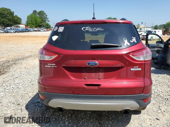 2014 Ford Escape SE with VIN 1FMCU0GX2EUD62962, listed as a Copart auction lot 54368775 with 63,495 mi miles and Salvage Title. Bid and sale history available at DreamBid. Image 6.