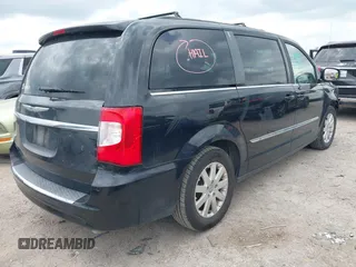 2016 Chrysler Town & Country Touring with VIN 2C4RC1BG7GR287707, listed as a IAAI auction lot 42136625 with 86,684 mi miles and . Bid and sale history available at DreamBid. Image 4.