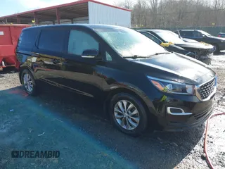 2020 Kia Sedona L with VIN KNDMA5C17L6601925, listed as a IAAI auction lot 41617726 with 103,650 mi miles. Bid and sale history available at carsss.com. Image 1.