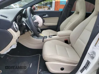 2014 Mercedes-Benz CLA 250 with VIN WDDSJ4GB3EN124980, listed as a Copart auction lot 57704585 with 86,643 mi miles and Salvage title. Bid and sale history available at DreamBid. Image 7.