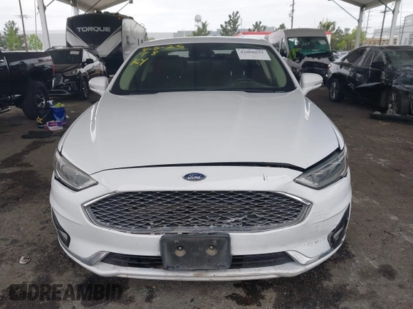 2019 Ford Fusion Titanium with VIN 3FA6P0K90KR236674, listed as a IAAI auction lot 42008633 with 99,737 mi miles and . Bid and sale history available at DreamBid. Image 12.