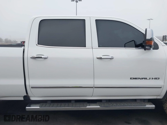 2015 GMC Sierra 2500HD Denali with VIN 1GT120E85FF681680, listed as a IAAI auction lot 42081711 with 67,676 mi miles and . Bid and sale history available at DreamBid. Image 13.