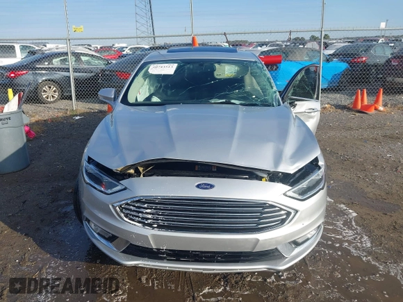 2017 Ford Fusion SE z VIN 3FA6P0HD4HR118826, wystawiony jako IAAI lot #40743513 z przebiegiem 130 038 mil mil oraz . Historia ofert i sprzedaży dostępna na DreamBid. Obrazek 12.