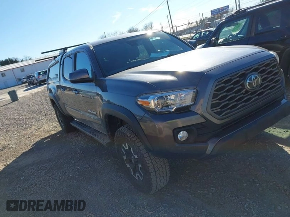 2021 Toyota Tacoma 4WD SR5 with VIN 5TFDZ5BN8MX058531, listed as a IAAI auction lot 41628820 with 102,004 mi miles. Bid and sale history available at carsss.com. Image 1.