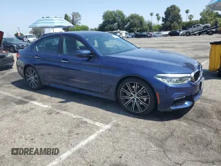 2018 BMW 5 Series 540i with VIN WBAJE5C51JWA94673, listed as a Copart auction lot 59807825 with 77,051 mi miles and Salvage title. Bid and sale history available at DreamBid. Image 4.