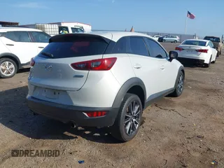 2018 Mazda CX-3 Touring with VIN JM1DKDC73J0319938, listed as a IAAI auction lot 39861564 with 117,199 mi miles. Bid and sale history available at carsss.com. Image 4.