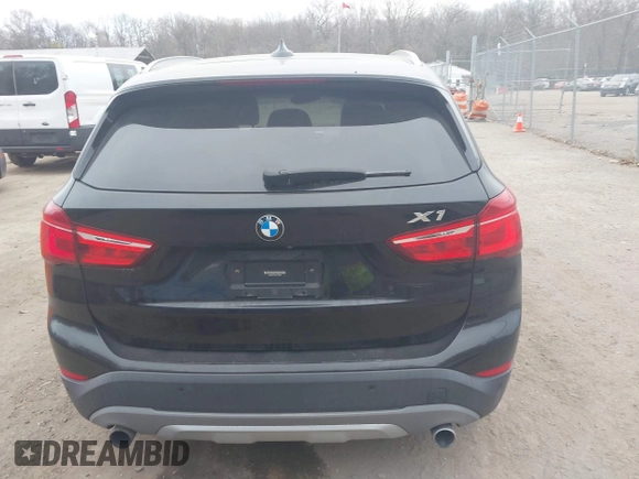 2017 BMW X1 xDrive28i with VIN WBXHT3C31H5F72958, listed as a IAAI auction lot 41782257 with 134,829 mi miles. Bid and sale history available at carsss.com. Image 16.