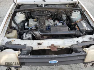 1988 Ford Escort z VIN 1FAPP959XJW370611, wystawiony jako Copart lot #86715994 z przebiegiem 3424 mil mil oraz Tytuł czysty. Historia ofert i sprzedaży dostępna na DreamBid. Obrazek 11.