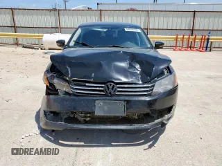 2014 Volkswagen Passat Wolfsburg Edition z VIN 1VWAT7A36EC030197, wystawiony jako Copart lot #59638335 z przebiegiem 236 622 mil mil oraz Szkoda całkowita • Salvage title. Historia ofert i sprzedaży dostępna na DreamBid. Obrazek 5.
