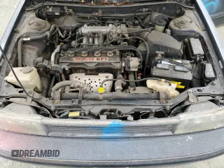 1991 Toyota Corolla z VIN 1NXAE94A0MZ186484, wystawiony jako Copart lot #76421584 z przebiegiem 201 018 mil mil oraz Czysty tytuł • Clean title. Historia ofert i sprzedaży dostępna na DreamBid. Obrazek 11.