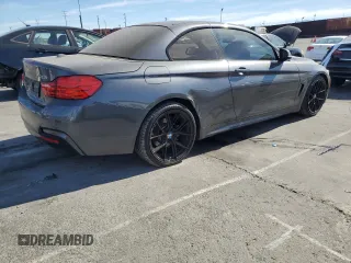 2014 BMW 4 Series 428i with VIN WBA3V7C55EP770804, listed as a Copart auction lot 79122804 with 98,890 mi miles and Salvage Title. Bid and sale history available at DreamBid. Image 3.