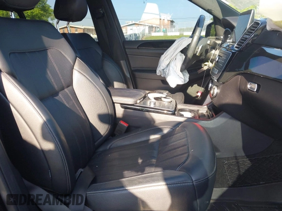 2018 Mercedes-Benz GLS 450 with VIN 4JGDF6EE1JB075332, listed as a IAAI auction lot 42120007 with 111,559 mi miles and . Bid and sale history available at DreamBid. Image 5.