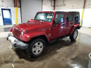 2012 Jeep Wrangler Unlimited Altitude with VIN 1C4BJWEG9CL141912, listed as a Copart auction lot 89321485 with 122,260 mi miles and Salvage title. Bid and sale history available at DreamBid. Image 1.