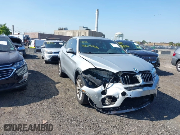 2018 BMW X6 xDrive35i z VIN 5UXKU2C51J0X50507, wystawiony jako IAAI lot #40275236 z przebiegiem 67 523 mil mil oraz . Historia ofert i sprzedaży dostępna na DreamBid. Obrazek 1.