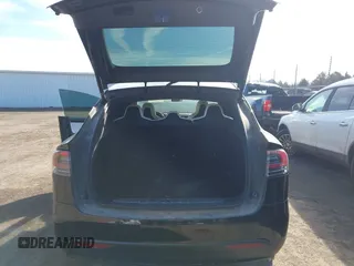 2018 Tesla Model X 75D with VIN 5YJXCDE44JF091690, listed as a IAAI auction lot 41585617 with 128,826 mi miles and . Bid and sale history available at DreamBid. Image 16.