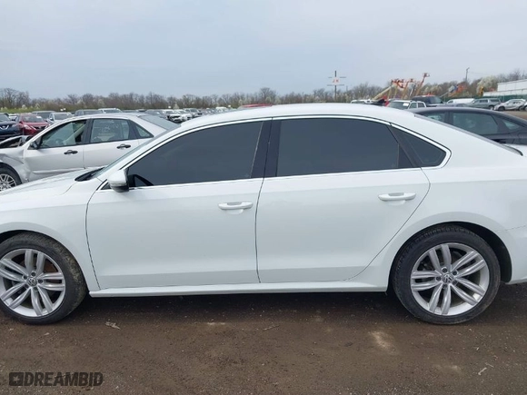 2018 Volkswagen Passat 2.0T SE with VIN 1VWBA7A35JC018885, listed as a IAAI auction lot 41955324 with 107,046 mi miles. Bid and sale history available at carsss.com. Image 14.