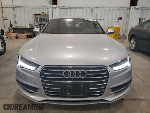 2016 Audi A7 3.0 Prestige with VIN WAU2GAFC7GN104801, listed as a Copart auction lot 64997833 with 74,427 mi miles. Bid and sale history available at carsss.com. Image 5.