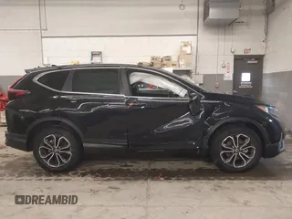 2021 Honda CR-V EX with VIN 2HKRW2H52MH655464, listed as a IAAI auction lot 41607374 with 60,697 mi miles. Bid and sale history available at carsss.com. Image 14.