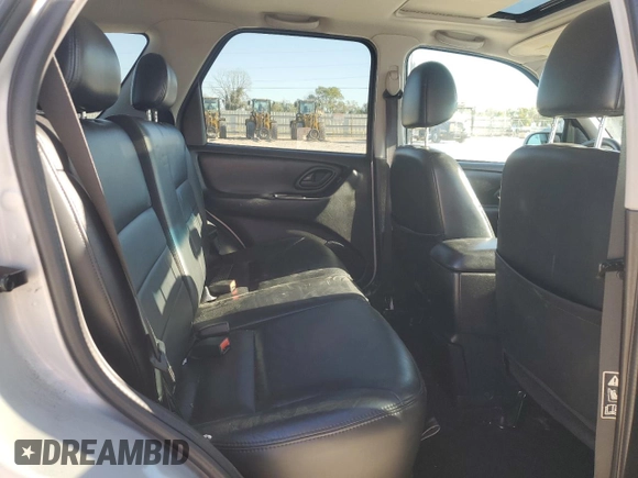 2004 Ford Escape Limited with VIN 1FMCU041X4KA45604, listed as a Copart auction lot 80974334 with 88,687 mi miles and Salvage title. Bid and sale history available at DreamBid. Image 12.
