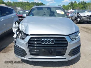 2018 Audi Q3 Premium with VIN WA1ECCFS0JR022112, listed as a IAAI auction lot 42356014 with 56,671 mi miles and . Bid and sale history available at DreamBid. Image 12.