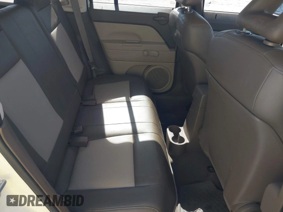 2007 Jeep Patriot Sport with VIN 1J8FT28W07D363173, listed as a IAAI auction lot 41791711 with 117,446 mi miles and . Bid and sale history available at DreamBid. Image 8.