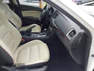 2014 Mazda 6 i Grand Touring with VIN JM1GJ1W67E1139945, listed as a IAAI auction lot 42194243 with 205,545 mi miles. Bid and sale history available at carsss.com. Image 5.