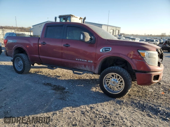 2016 Nissan Titan XD Platinum Reserve with VIN 1N6BA1F43GN502064, listed as a Copart auction lot 82686584 with 275,417 mi miles and Salvage Title. Bid and sale history available at carsss.com. Image 4.