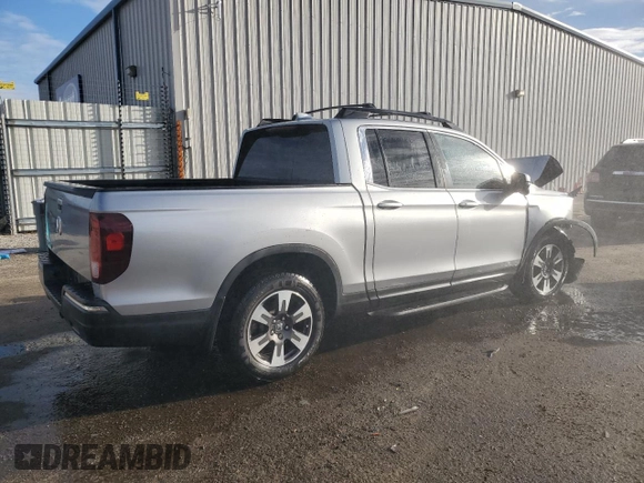2017 Honda Ridgeline RTL-T with VIN 5FPYK2F6XHB002959, listed as a Copart auction lot 87286384 with 97,749 mi miles and Salvage title. Bid and sale history available at DreamBid. Image 3.