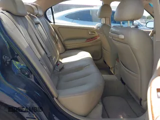 2003 Infiniti I35 Luxury with VIN JNKDA31AX3T108814, listed as a IAAI auction lot 41998013 with 197,883 mi miles. Bid and sale history available at carsss.com. Image 8.