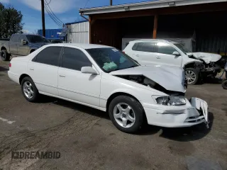 2000 Toyota Camry CE z VIN JT2BG22K2Y0479735, wystawiony jako Copart lot #50226755 z przebiegiem 282 694 mil mil oraz Nie do naprawy • Non repairable. Historia ofert i sprzedaży dostępna na DreamBid. Obrazek 4.