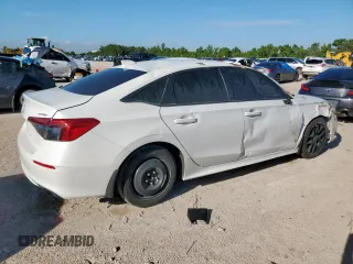 2023 Honda Civic Sport with VIN 2HGFE2F57PH511027, listed as a Copart auction lot 62703695 with 33,899 mi miles and Salvage title. Bid and sale history available at DreamBid. Image 3.