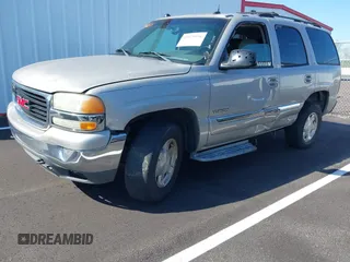 2004 GMC Yukon SLT with VIN 1GKEK13Z14J173689, listed as a IAAI auction lot 41979936 with 1 mi miles. Bid and sale history available at carsss.com. Image 2.