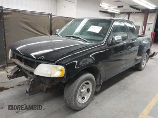 2001 Ford F-150 XL with VIN 1FTRX07W61KF82074, listed as a IAAI auction lot 41444721 with 125,494 mi miles. Bid and sale history available at carsss.com. Image 18.