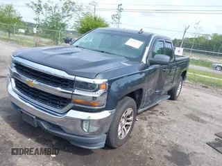 2017 Chevrolet Silverado 1500 LT with VIN 1GCRCREC4HZ298856, listed as a IAAI auction lot 42102225 with 147,501 mi miles and . Bid and sale history available at DreamBid. Image 2.