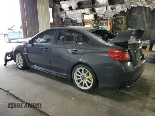 2020 Subaru WRX STI z VIN JF1VA2E65L9818521, wystawiony jako Copart lot #57142425 z przebiegiem 37 495 mil mil oraz Szkoda całkowita • Salvage title. Historia ofert i sprzedaży dostępna na DreamBid. Obrazek 2.
