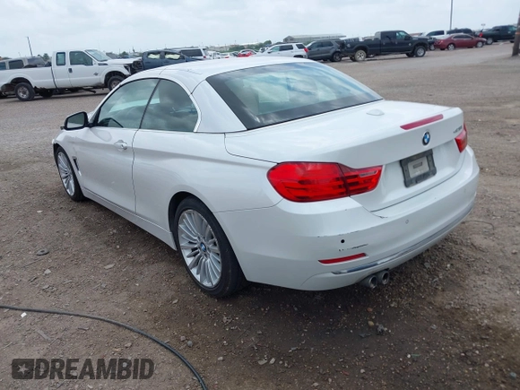 2015 BMW 4 Series 428i z VIN WBA3V5C53FP751805, wystawiony jako IAAI lot #42150102 z przebiegiem 113 381 mil mil oraz . Historia ofert i sprzedaży dostępna na DreamBid. Obrazek 3.